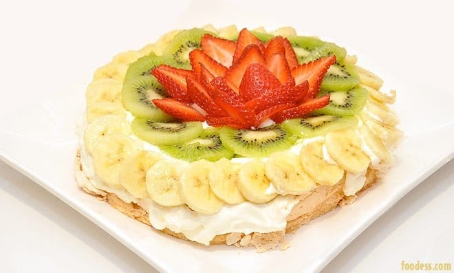 australian pavlova with banana, kiwi and strawberries