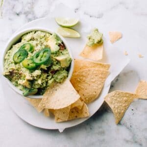 guacamole from scratch in a bowl with tortilla chips