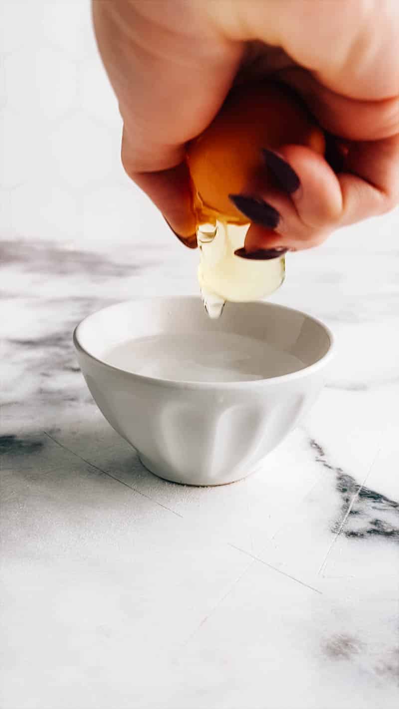 Crack egg into ramekin with boiling water to poach in microwave