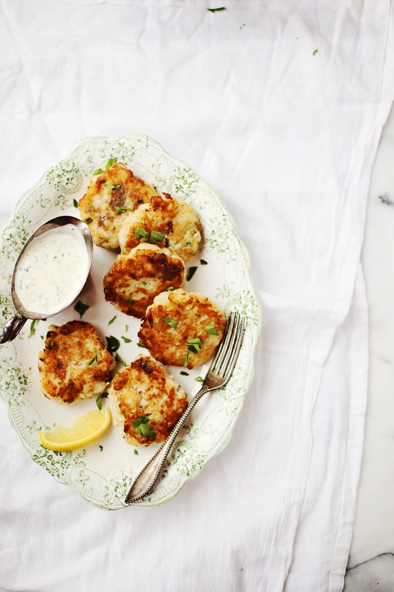 crispy potato and cod fish cakes on a plate