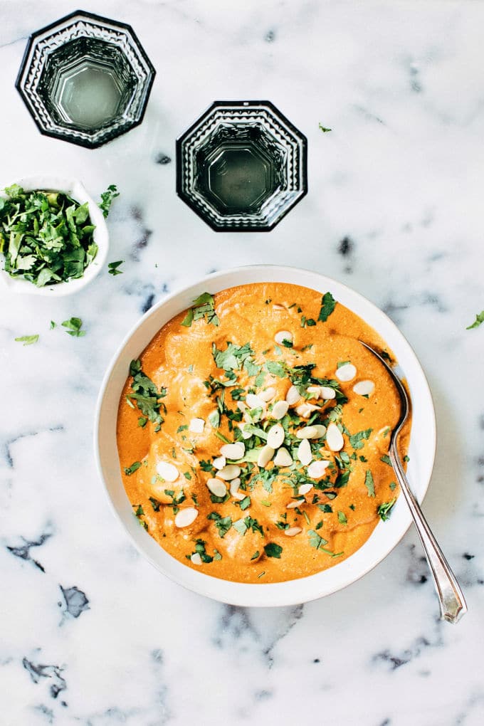 butter paneer masala in a bowl with fresh cilantro