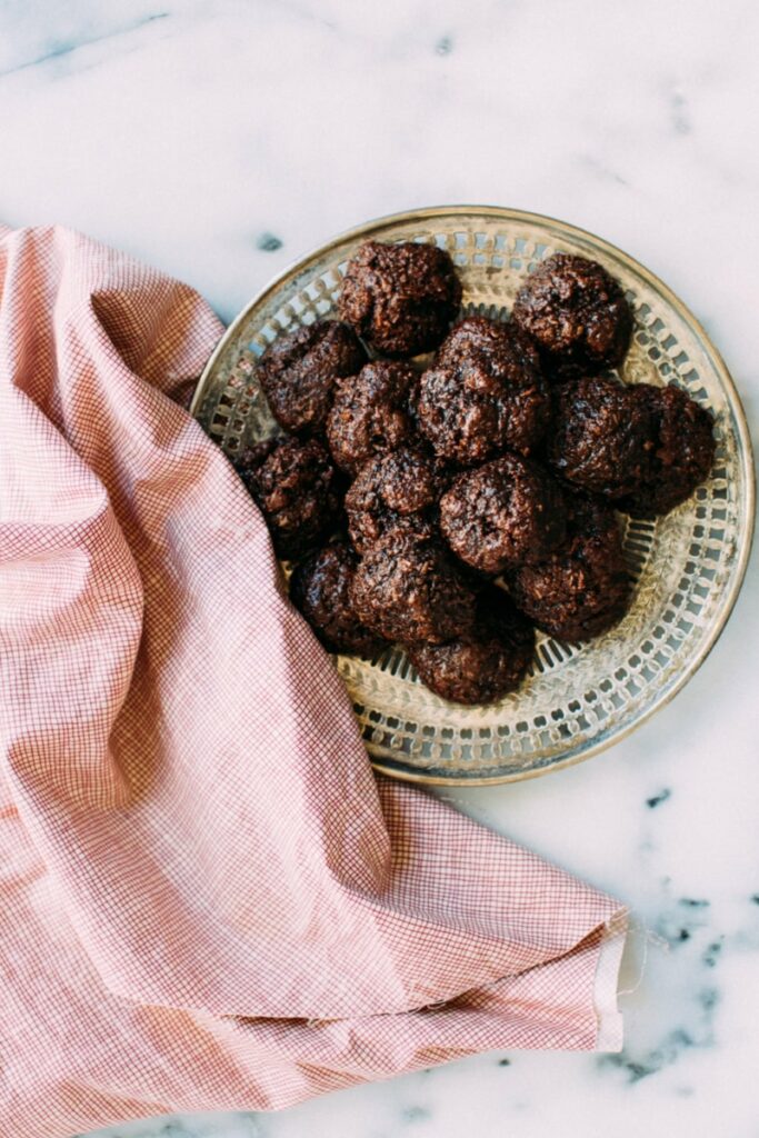 Chocolate coconut cookies on a plate.