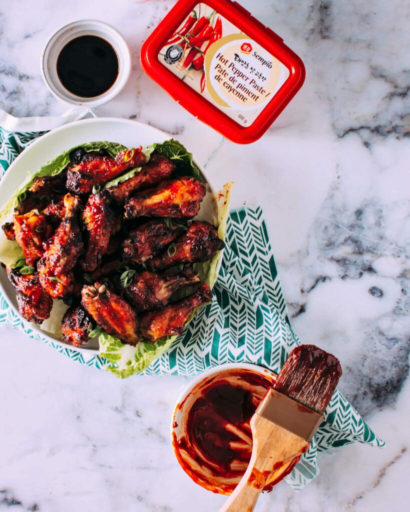 Sticky-spicy Korean chicken wings in a glossy gochujang sauce.