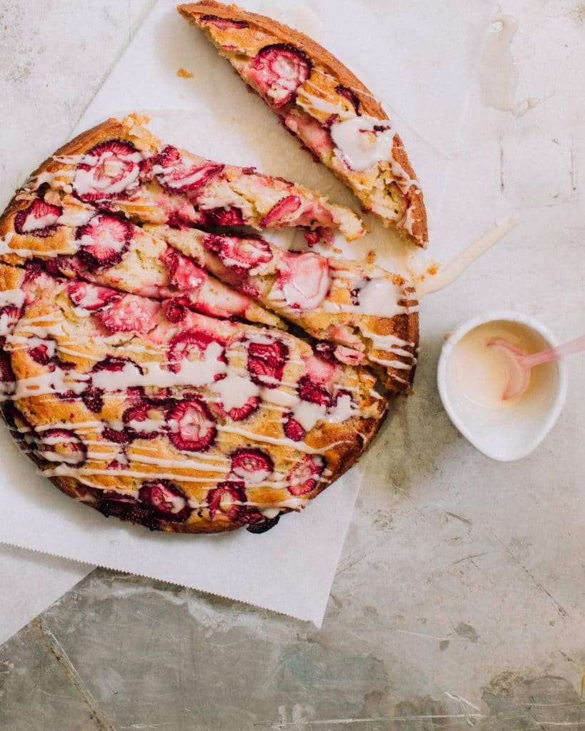 Strawberry buttermilk cake with vanilla glaze.