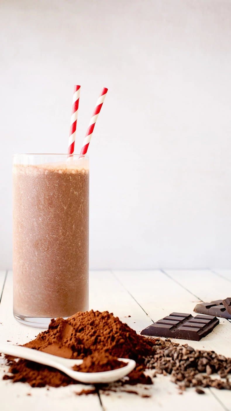 chocolate smoothie with cocoa powder and dark chocolate pieces