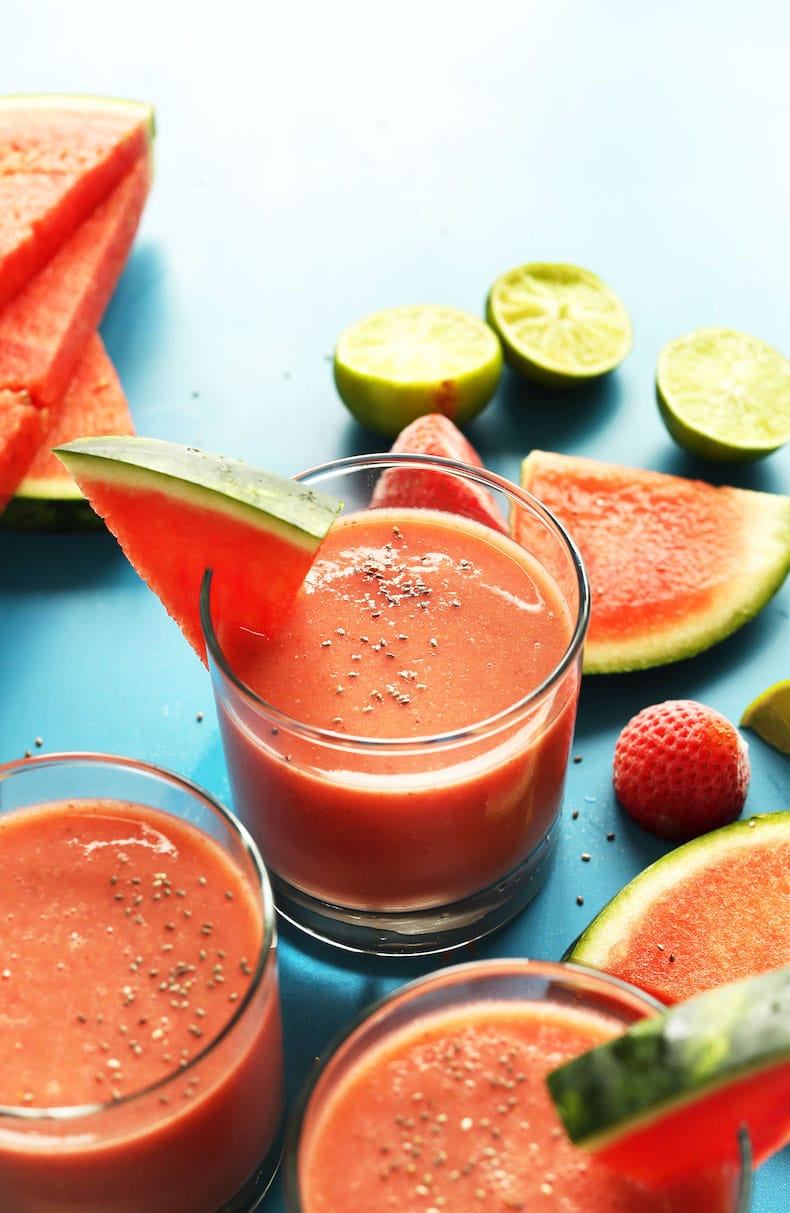 slices of watermelon and a glass with smoothie