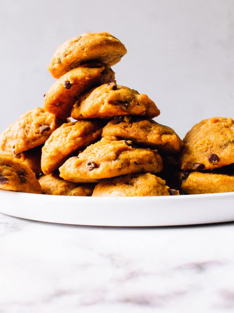 A pile of pumpkin chocolate chip cookies.