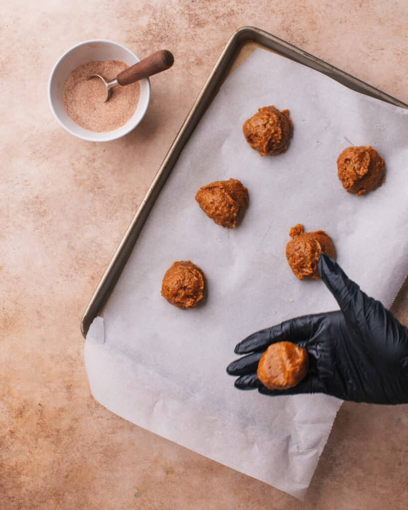 Shape the cookies using dampened hands.