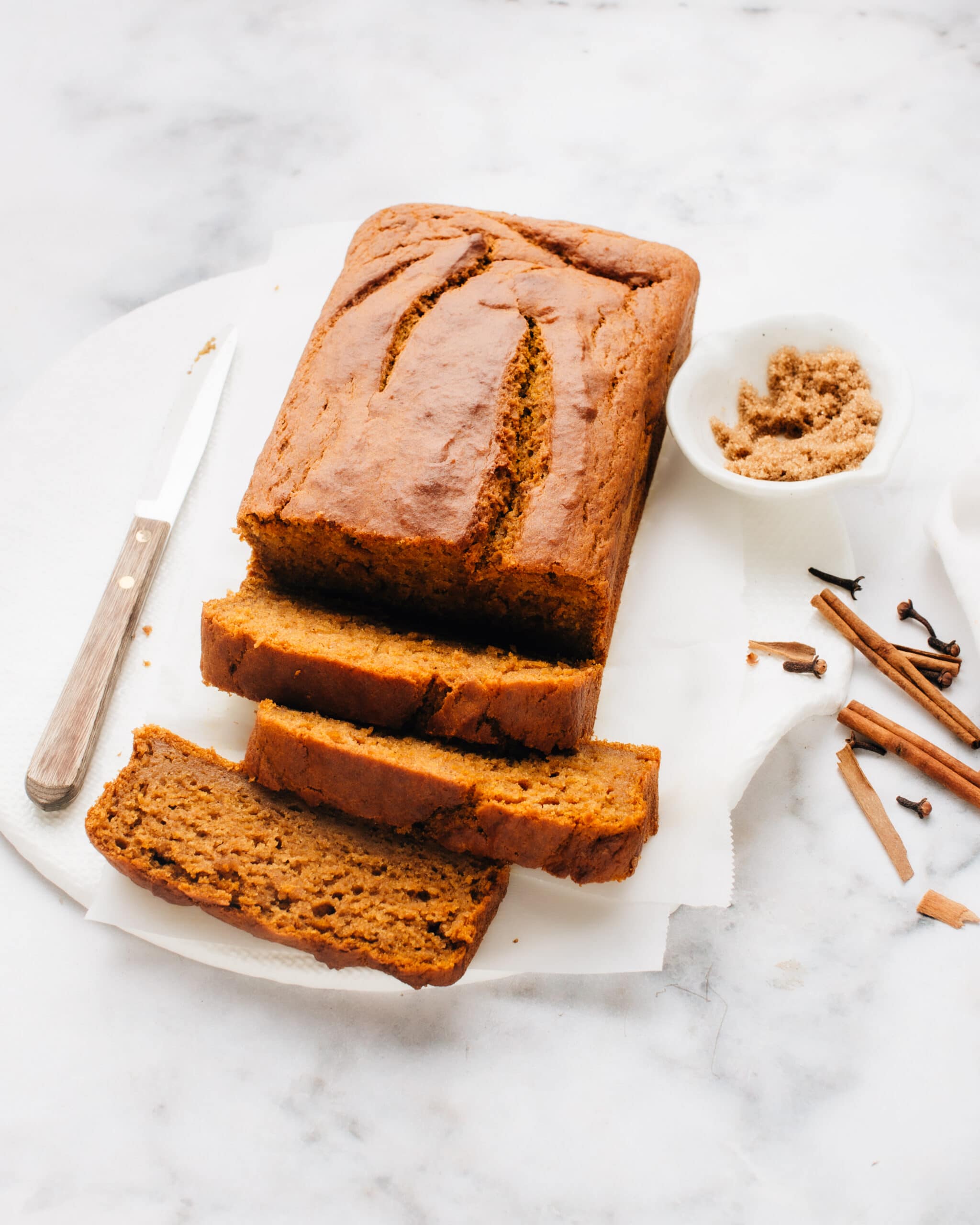 A perfect, soft pumpkin bread recipe with warm fall spices, guaranteed to stay moist for days.