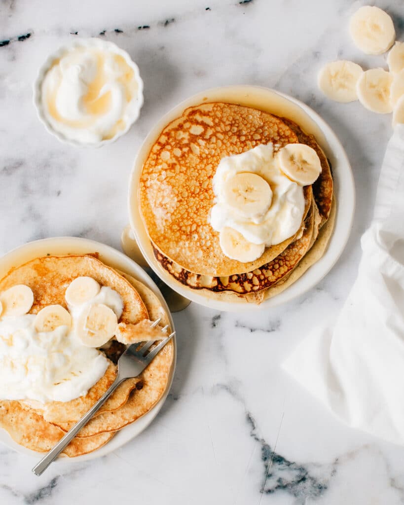 This healthy 3-Ingredient Banana Pancake Recipe is the best - so simple and packed with protein. It's easy to make flourless using gluten-free oats or almond flour. Perfect for a toddler breakfast, but I love them just as much as the little ones.