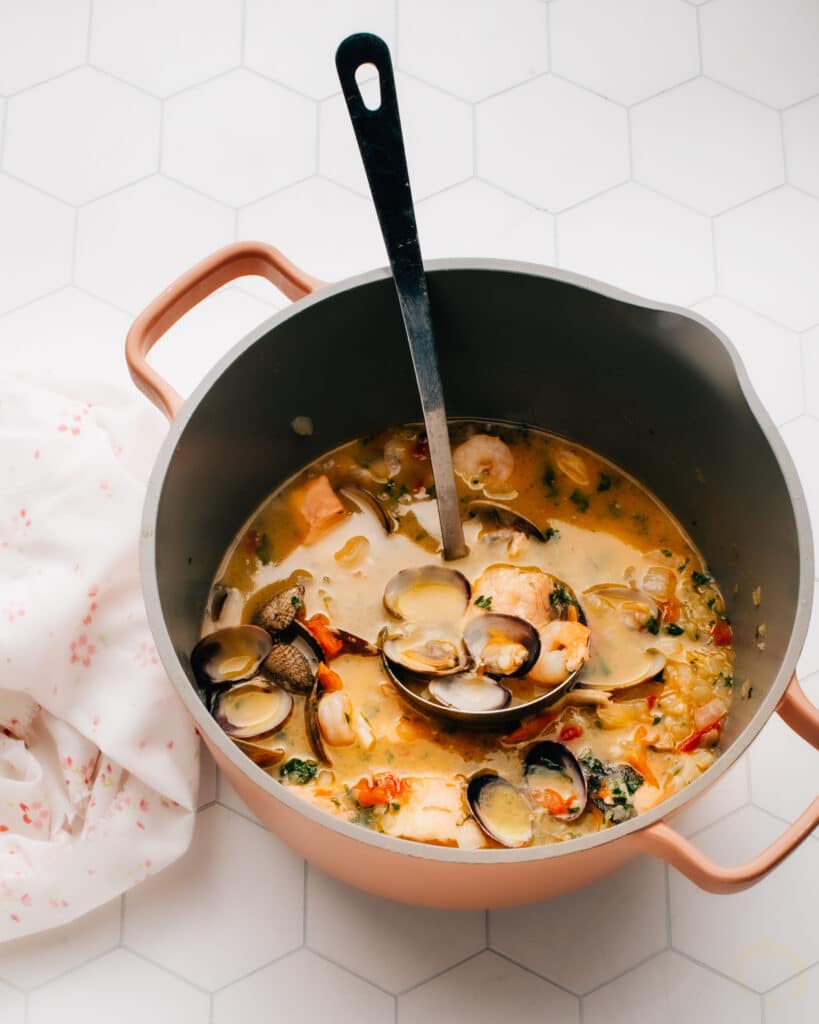 Seafood Cioppino is an incredibly flavourful tomato-based seafood soup. The best recipe is just the perfect amount of spicy. It is a light and healthy, brothy stew infused with dry white wine and loaded with mixed seafood. I am obsessed with how it feels super special, but is a deceptively quick and easy recipe.
