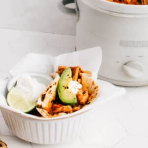 These easy shredded (or pulled) chicken tacos are cooked in a crockpot with a delicious sauce, and are perfect for any time of the year.