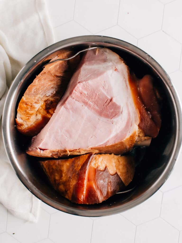 Smoked ham inside a pressure cooker.