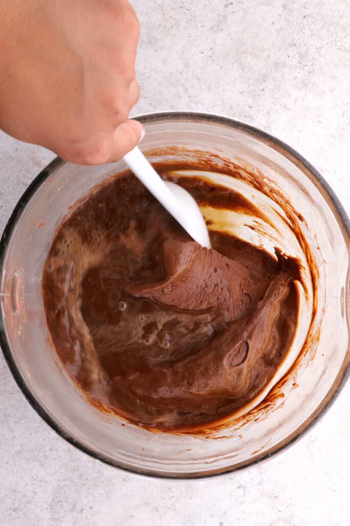 mixing the coffee into the moist chocolate cake batter,