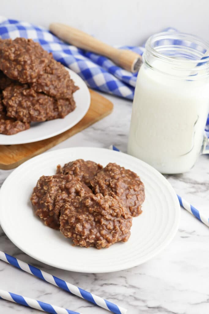 No-Bake Chocolate Peanut Butter Oatmeal Cookies in a plate with a glass of milk