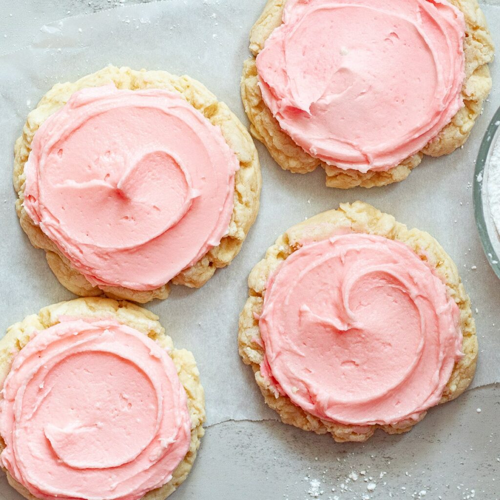 crumbl sugar cookies on a parchment paper
