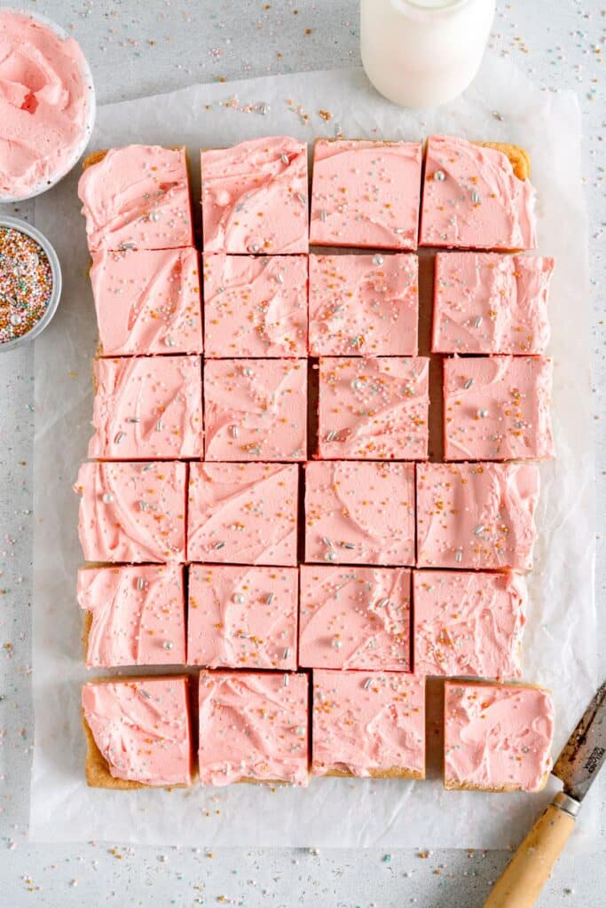 sliced squares of sugar cookies with frosting
