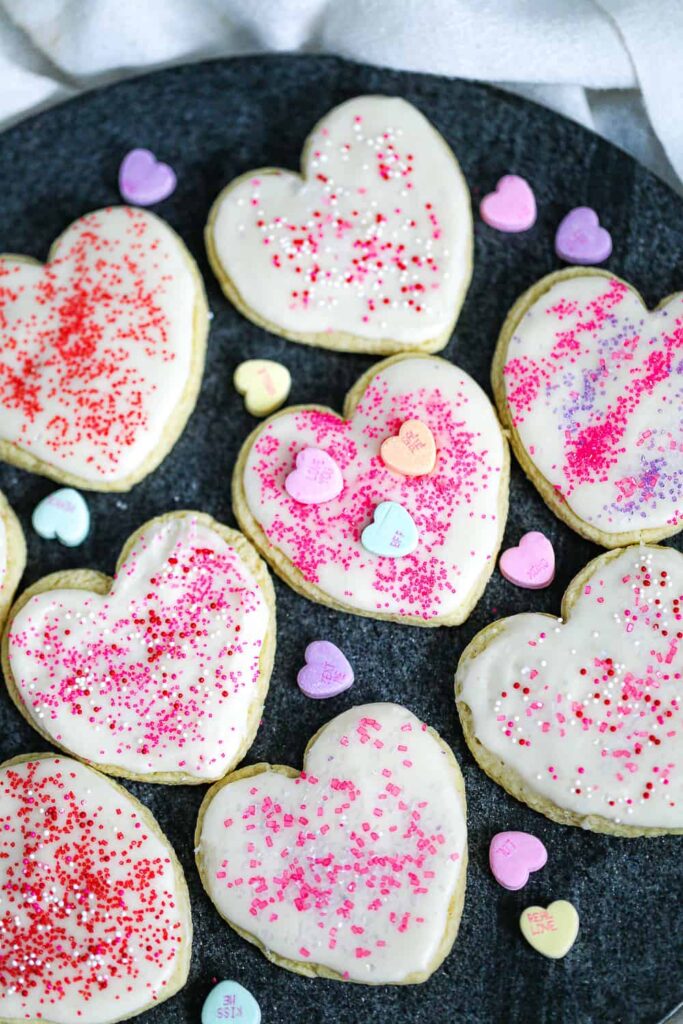Valentine sugar cookies decorated with sprinkles and hearts