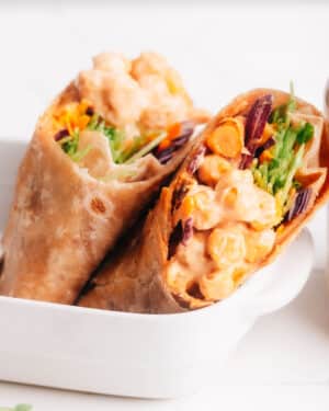 Buffalo chickpea wraps in a dish.