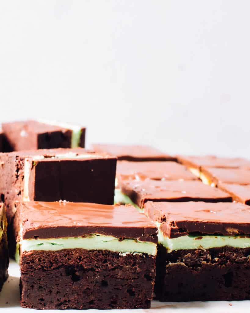 Side view of square-shaped mint chocolate brownies