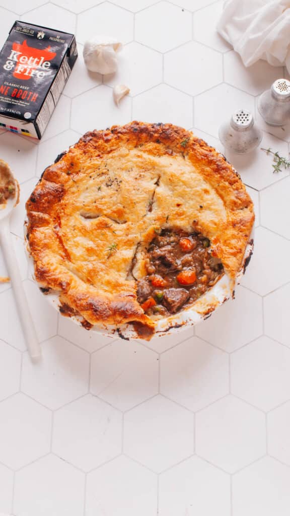 Beef pot pie with a piece out.