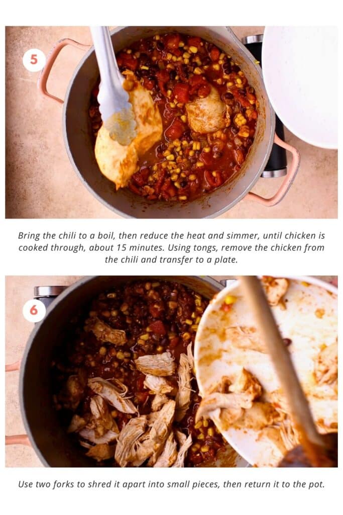 The chili is brought to a boil, then the heat is reduced, and it's simmered until the chicken is cooked through, which takes about 15 minutes. Using tongs, the chicken is then removed from the chili and transferred to a plate. Afterward, two forks are used to shred the chicken into small pieces before returning it to the pot.