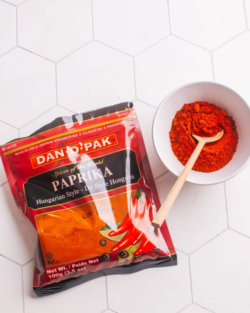 Paprika in a package and in a small bowl.