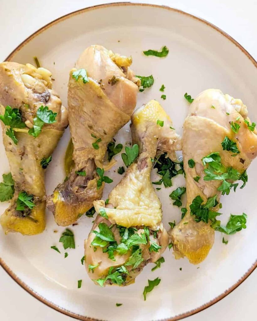 Boiled Chicken Drumsticks on a white plate