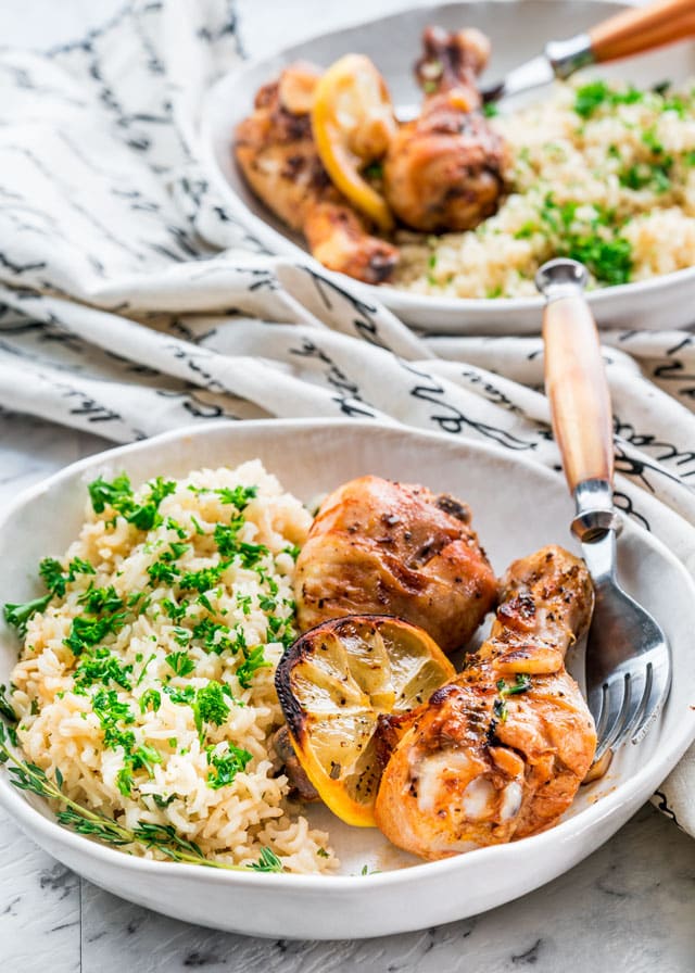 Lemon Garlic Roasted Chicken Legs on a plate serve with white rice