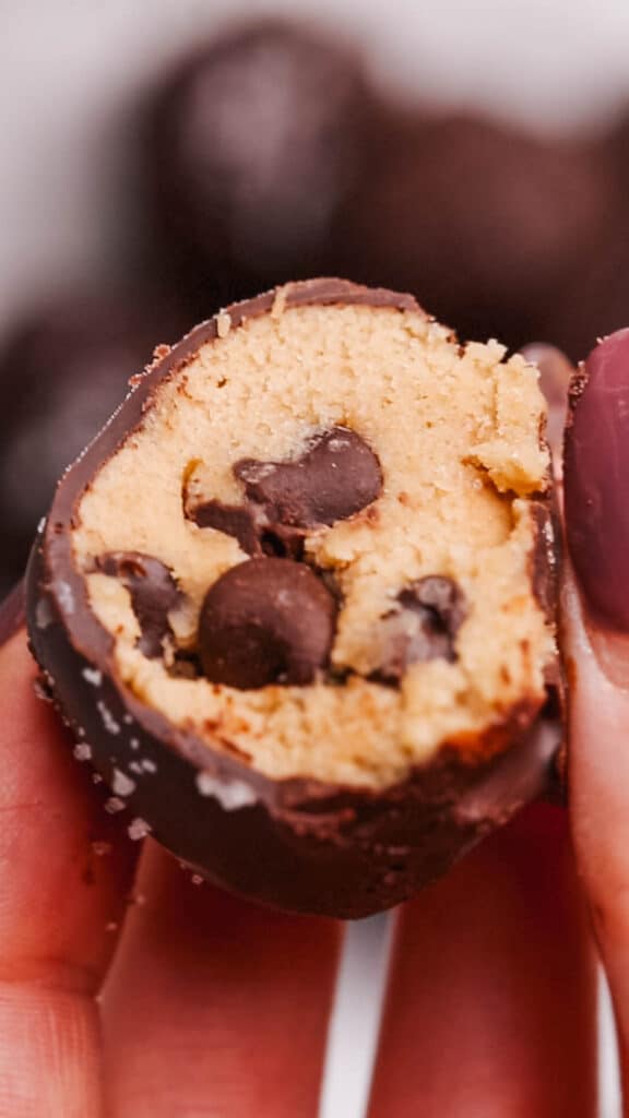 A close up shot of the inside of a cookie dough bite.