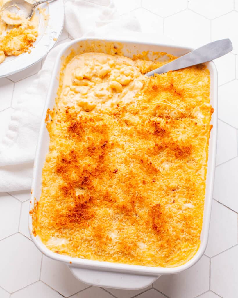 Baked Mac and Cheese with spoon on casserole.