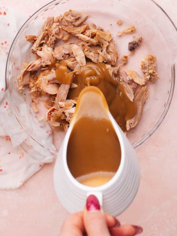 Turkey giblet gravy made with no drippings being poured over turkey.