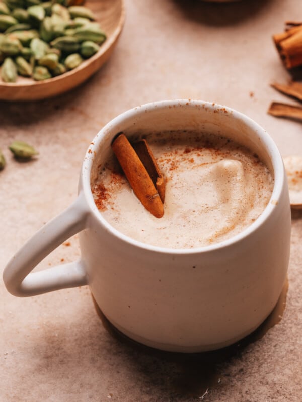 Chai coffee with cinnamon stick in cup