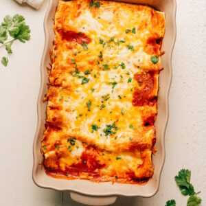 Cream Cheese Chicken Enchiladas in a baking dish.
