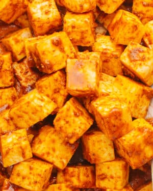 Showing how to marinate paneer.