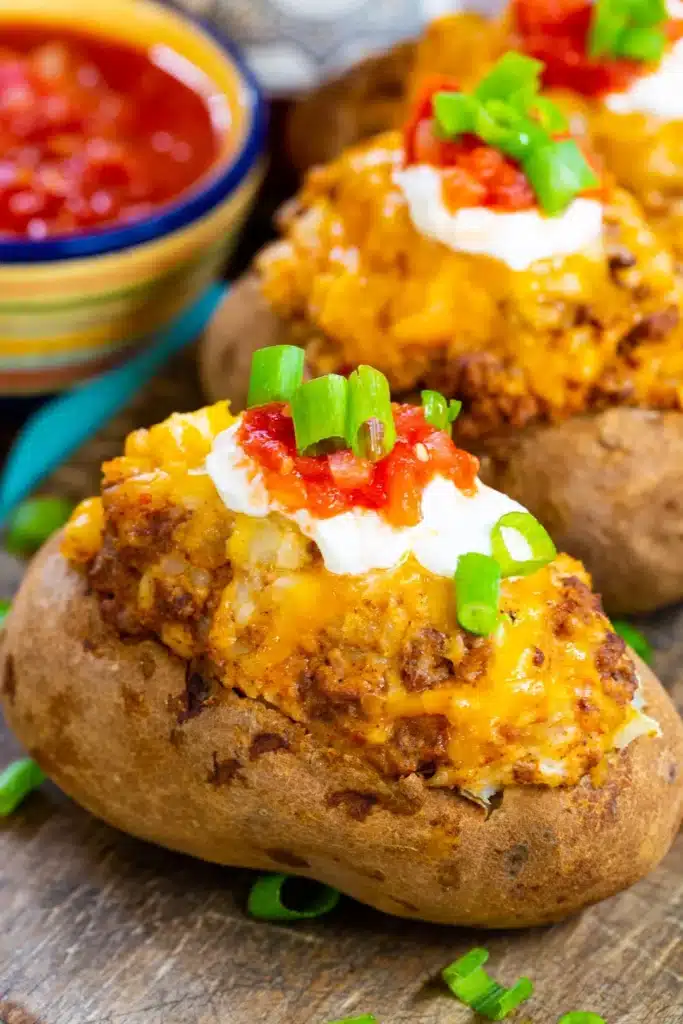 Twice stuffed baked potatoes with leftover taco meat