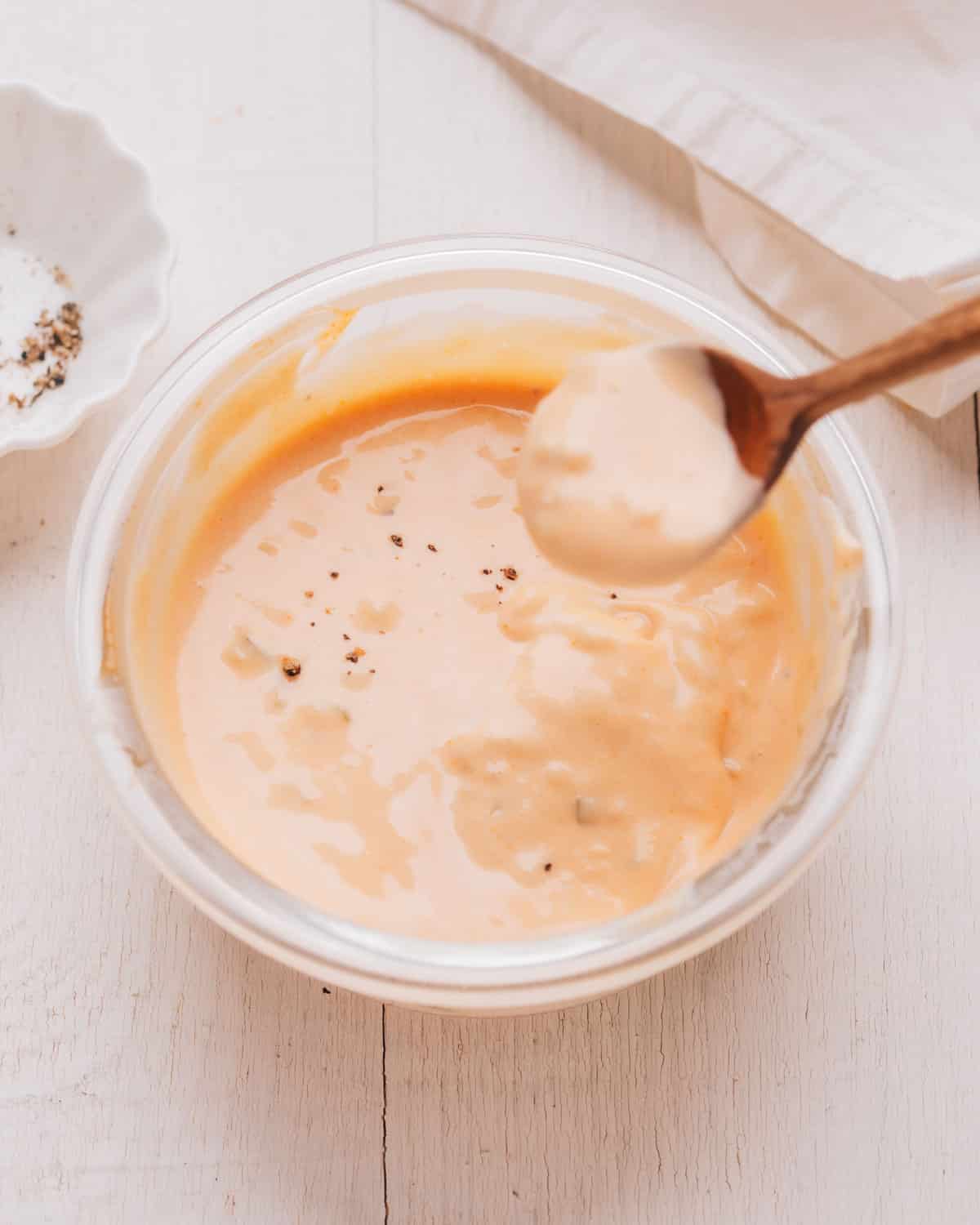 Big Mac Sauce in a glass dish with a spoon.
