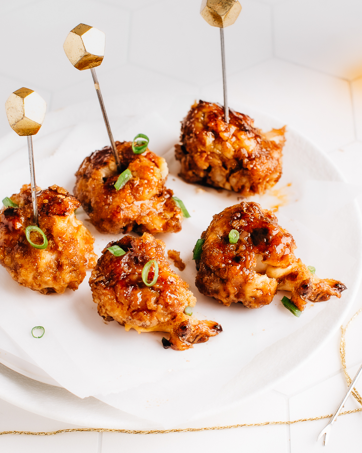 Cauliflower wings on a plate.