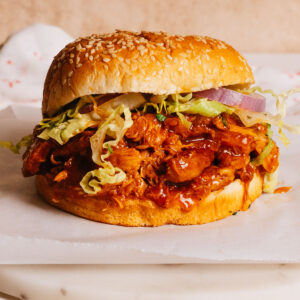 Crockpot BBQ Chicken in a sandwich.