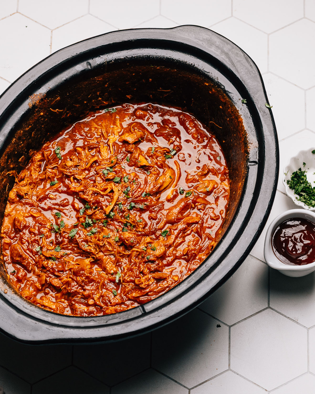 Crockpot BBQ Chicken in crock pot slow cooker insert.
