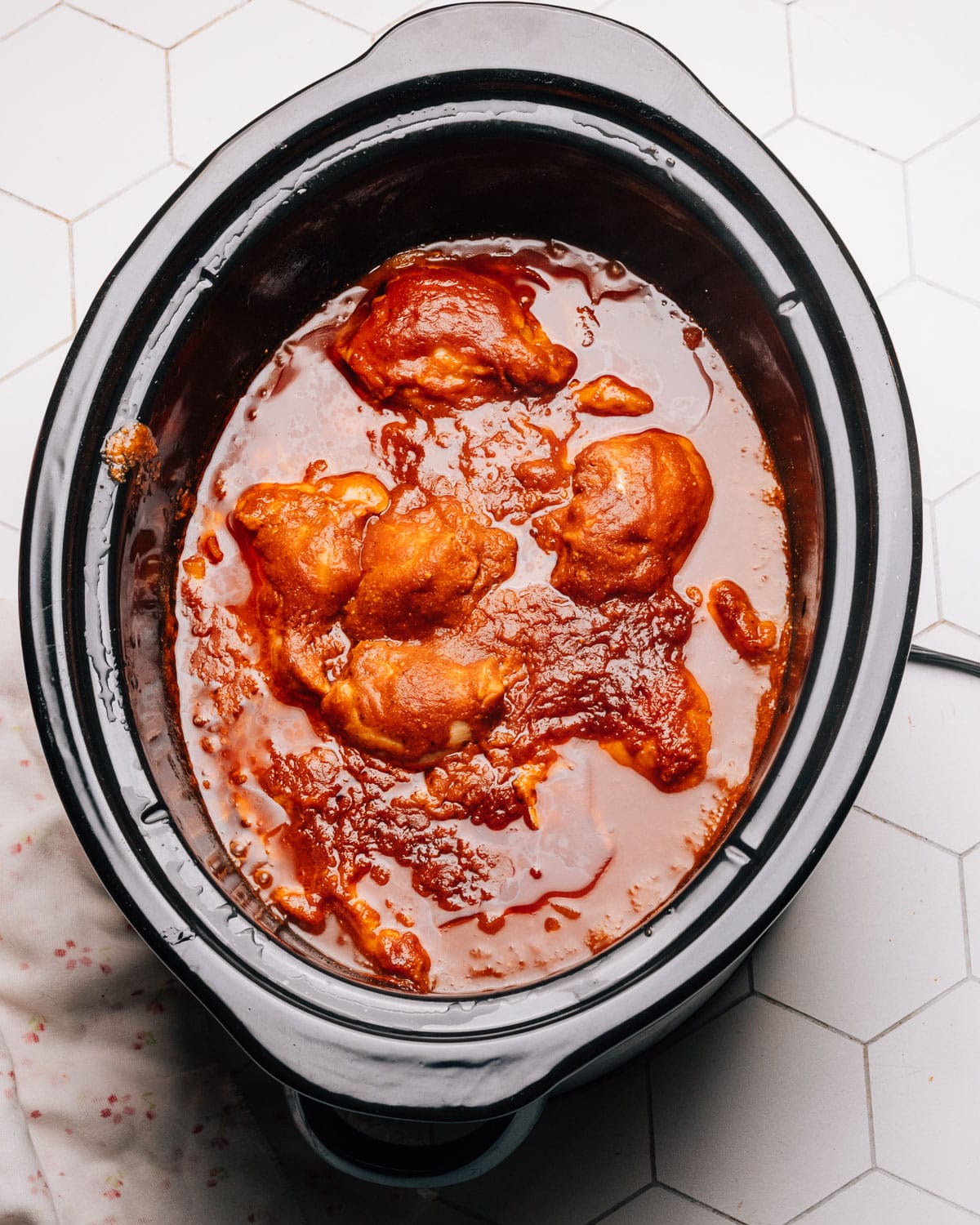 Making Crockpot BBQ Chicken.