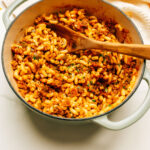 American Goulash recipe in a pot with a spoon.