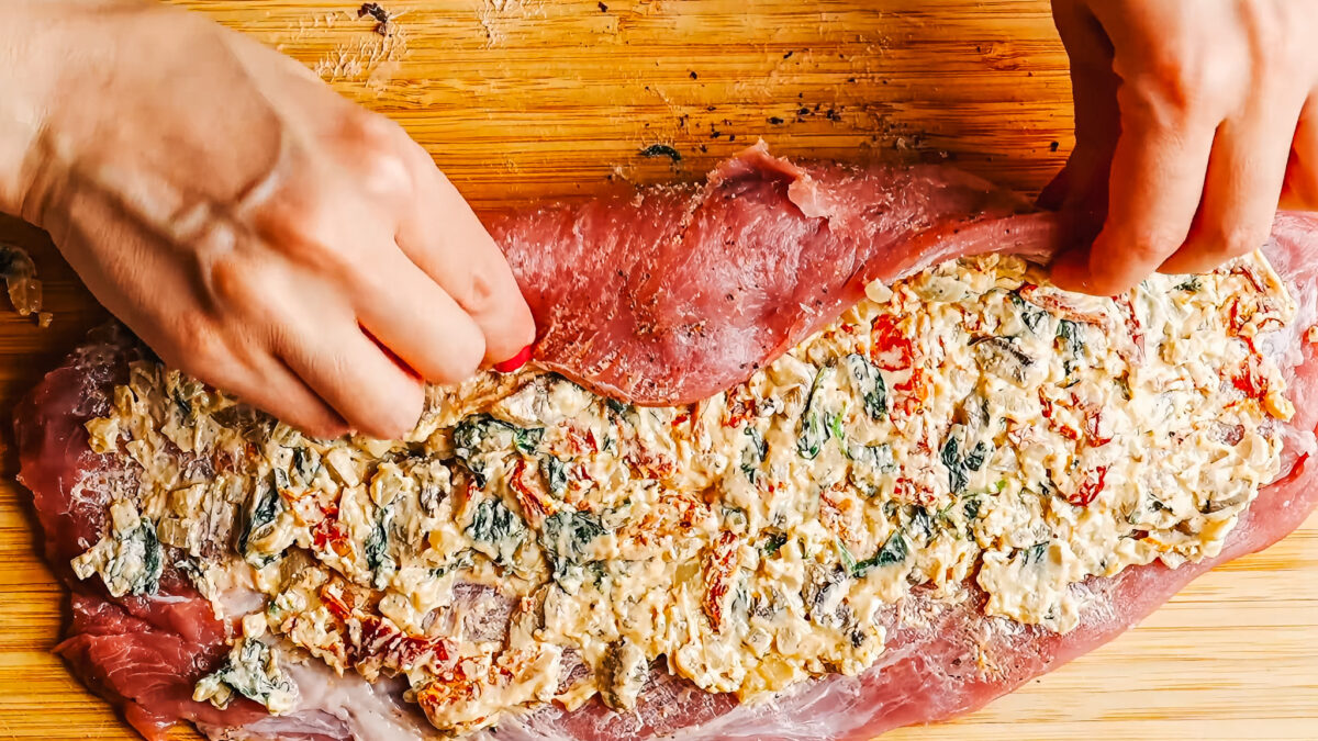 Steps of making stuffed pork tenderloin.