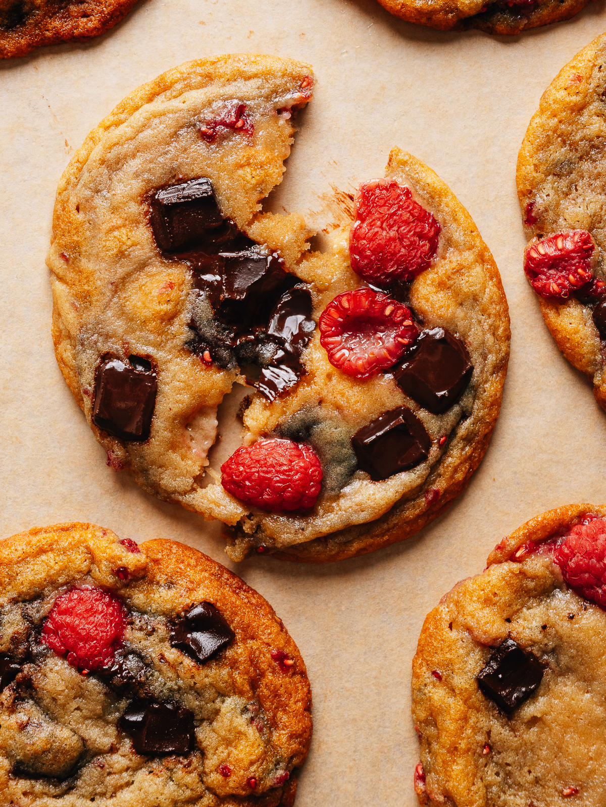 Soft raspberry cookies stacked with jammy fresh raspberries and melted chocolate.